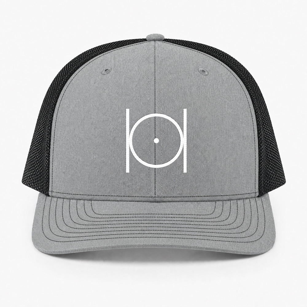 Point Within a Circle Trucker Hat - Embroidered