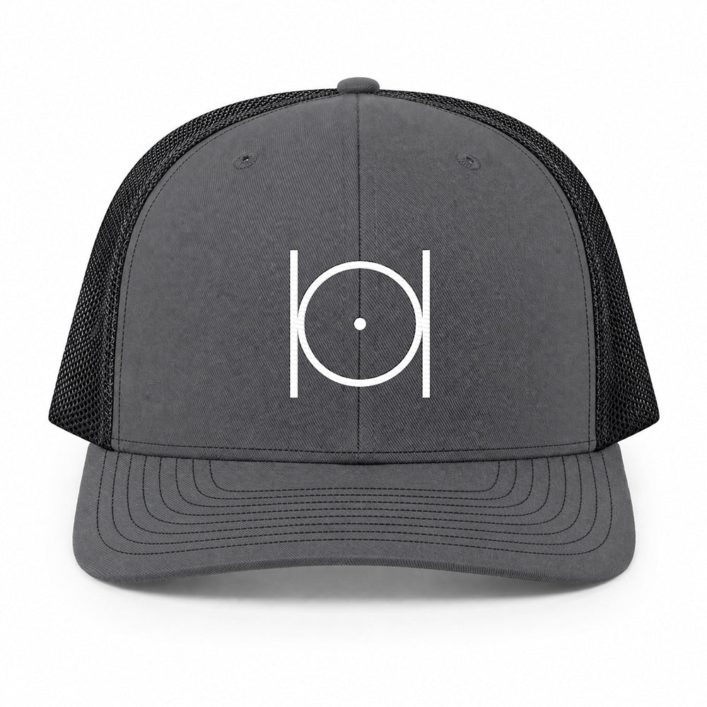 Point Within a Circle Trucker Hat - Embroidered